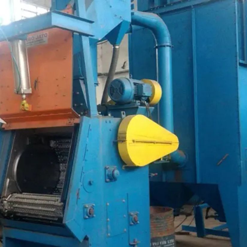 Máquinas de Jateamento por Tamboreamento com Esteira de Borracha de Aço.